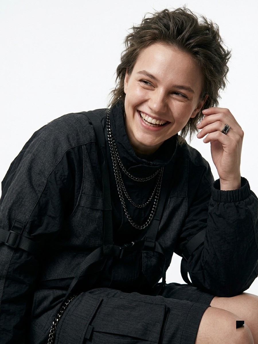 Dopameez cast — close crop, all-black layered fit, chains stacked