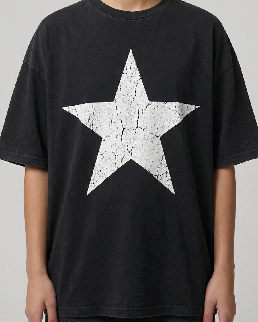 Star Menace Tee — washed-black oversized tee with a distressed white star graphic